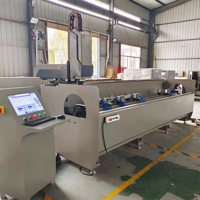 Double-head CNC drilling and milling machine for aluminum profile